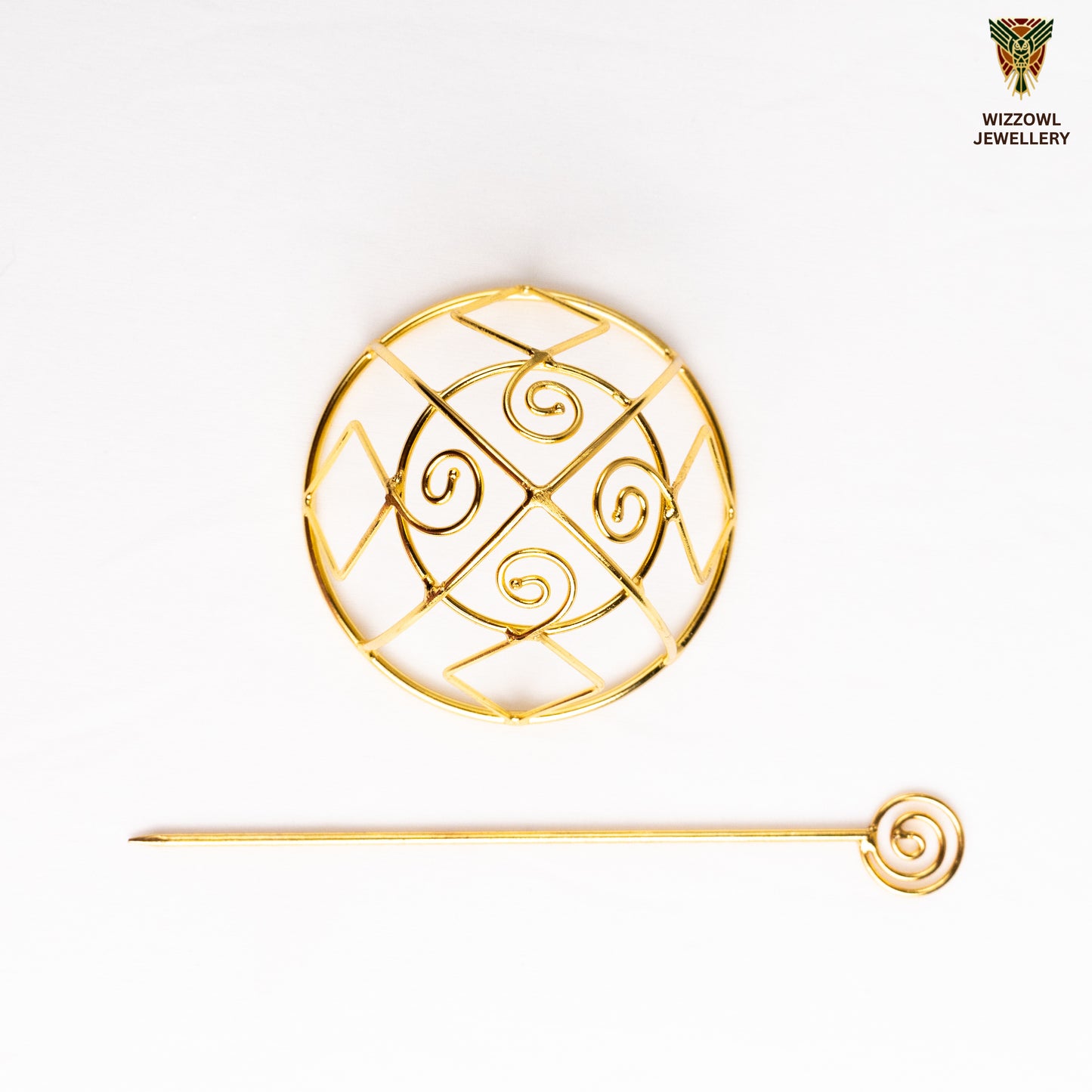 Gold spiral hairbun with concentric circles and intricate design. Elegant and artistic, it conveys a sense of sophistication.