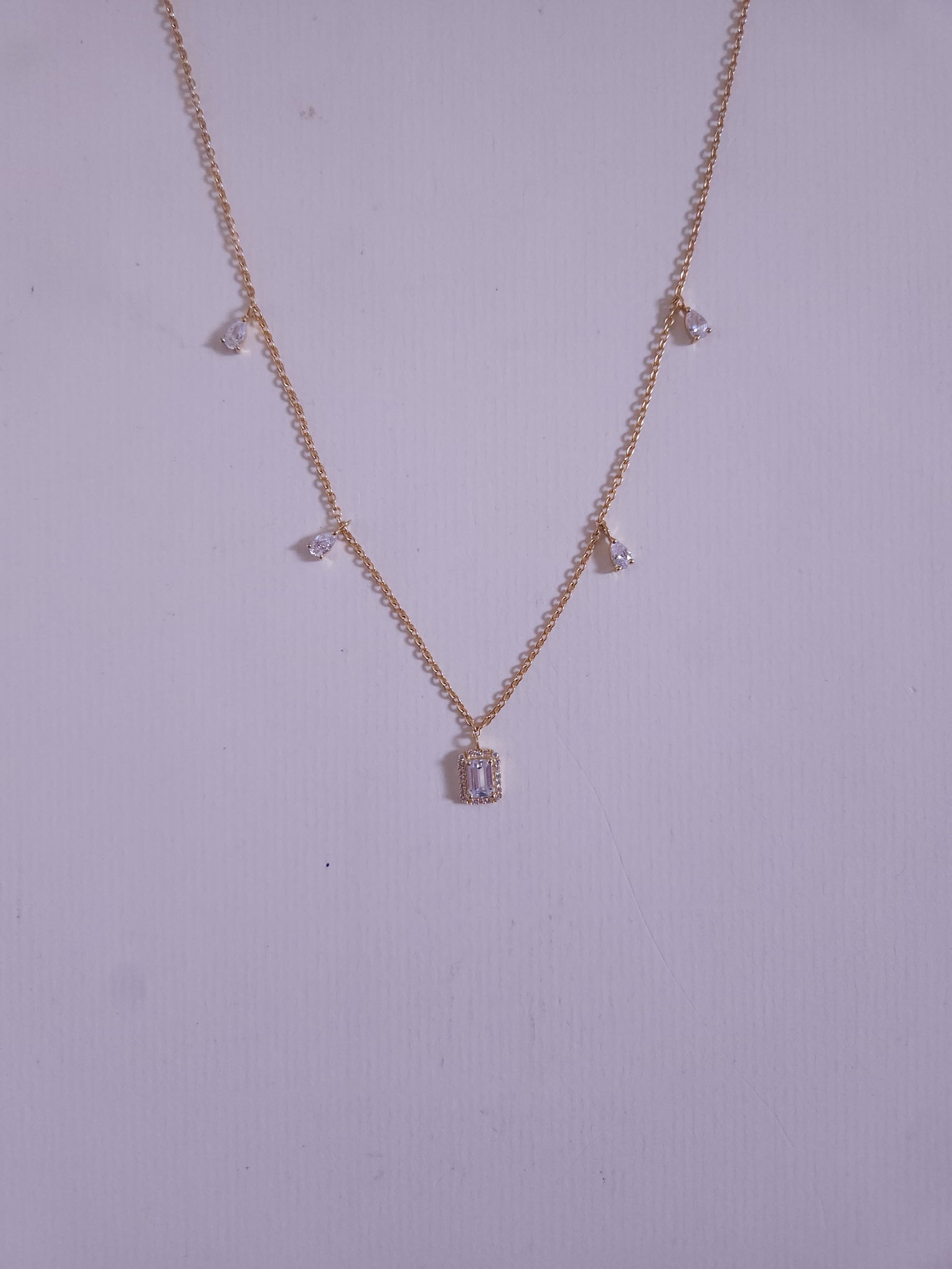 A classic silver chain with a smooth, polished finish and interlocking links, offering a timeless and versatile accessory.