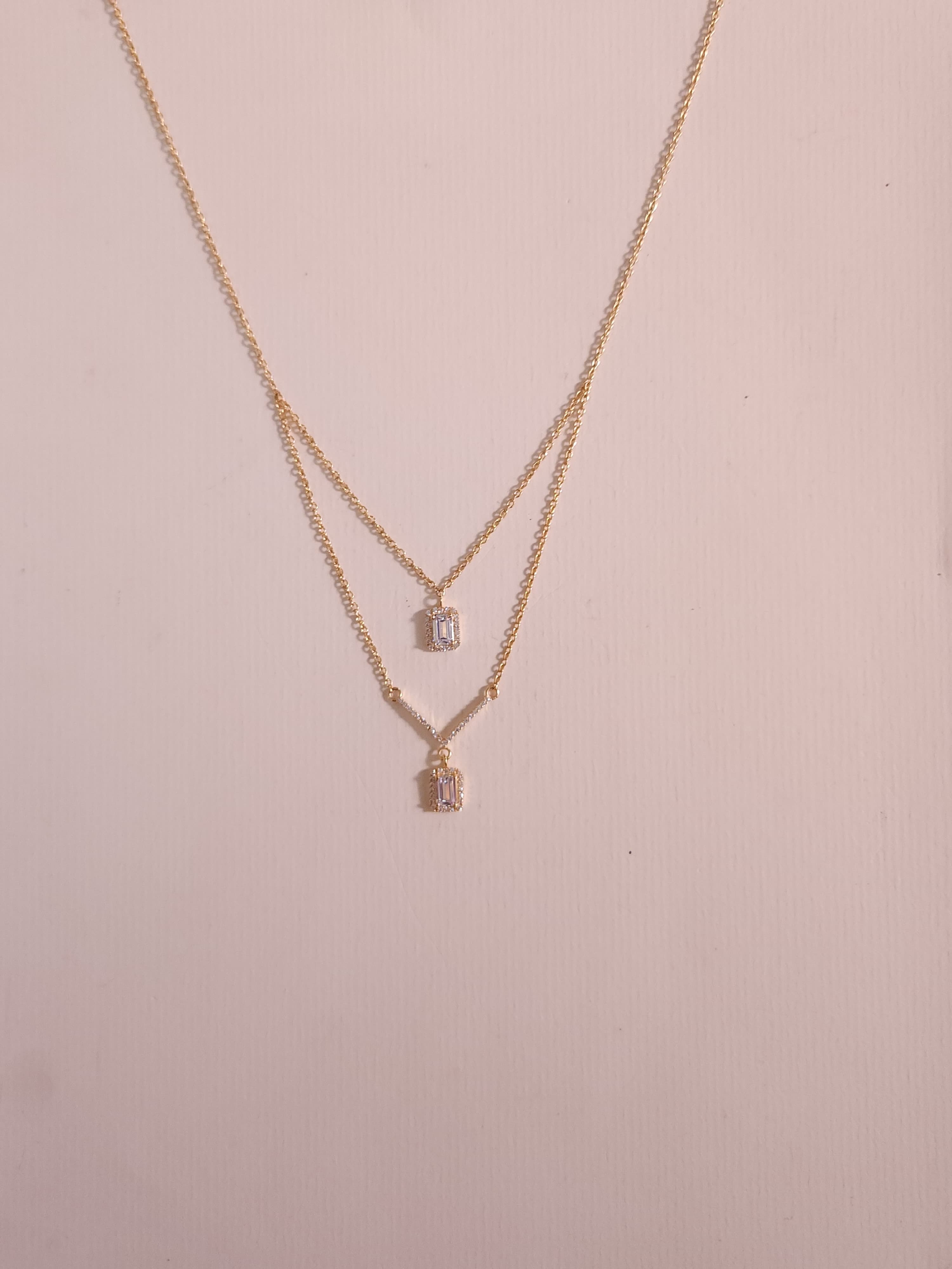 A classic silver chain with a smooth, polished finish and interlocking links, offering a timeless and versatile accessory.