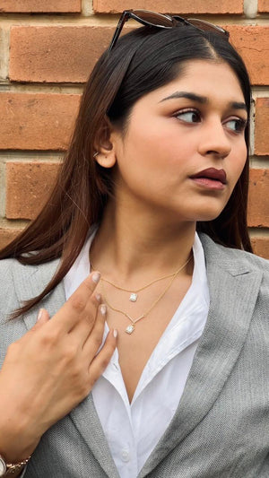 A classic silver chain with a smooth, polished finish and interlocking links, offering a timeless and versatile accessory.