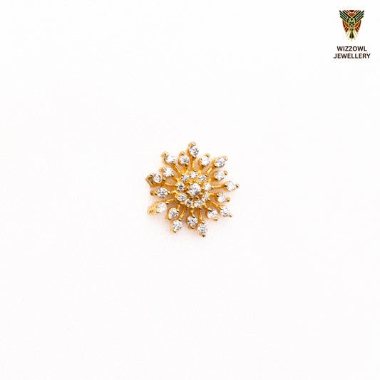 Silver nosepins featuring traditional motifs with a modern design twist, displayed on a neutral background.