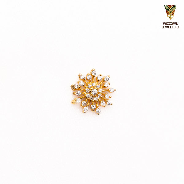 Silver nosepins featuring traditional motifs with a modern design twist, displayed on a neutral background.