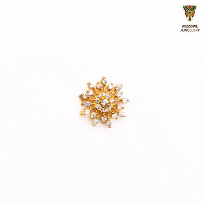 Silver nosepins featuring traditional motifs with a modern design twist, displayed on a neutral background.