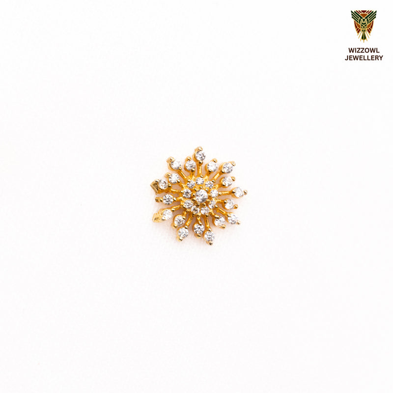 Silver nosepins featuring traditional motifs with a modern design twist, displayed on a neutral background.