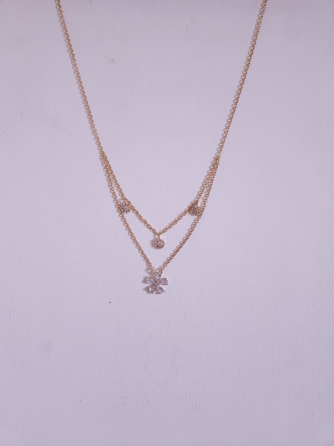 A classic silver chain with a smooth, polished finish and interlocking links, offering a timeless and versatile accessory.
