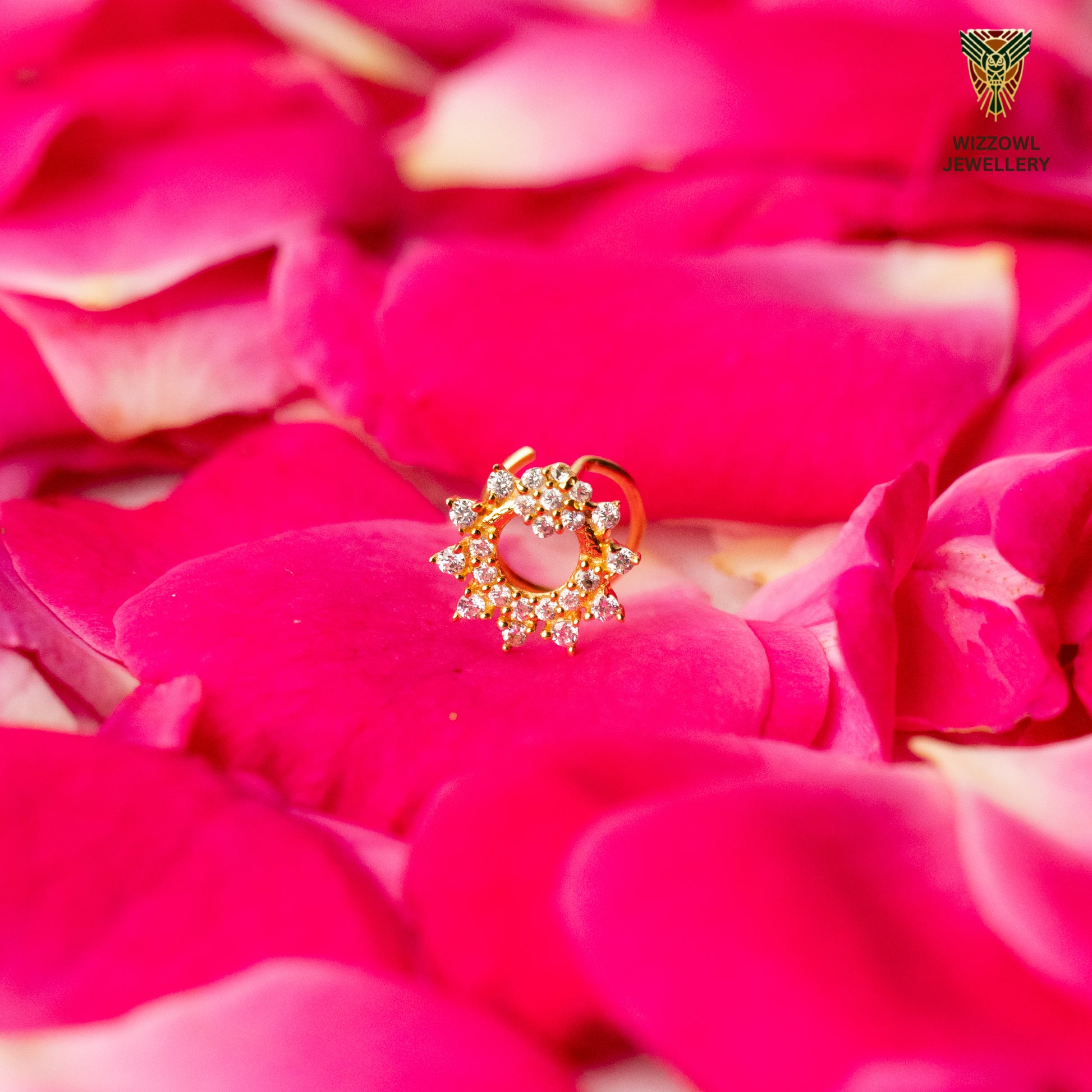 Silver nosepins featuring traditional motifs with a modern design twist, displayed on a neutral background.