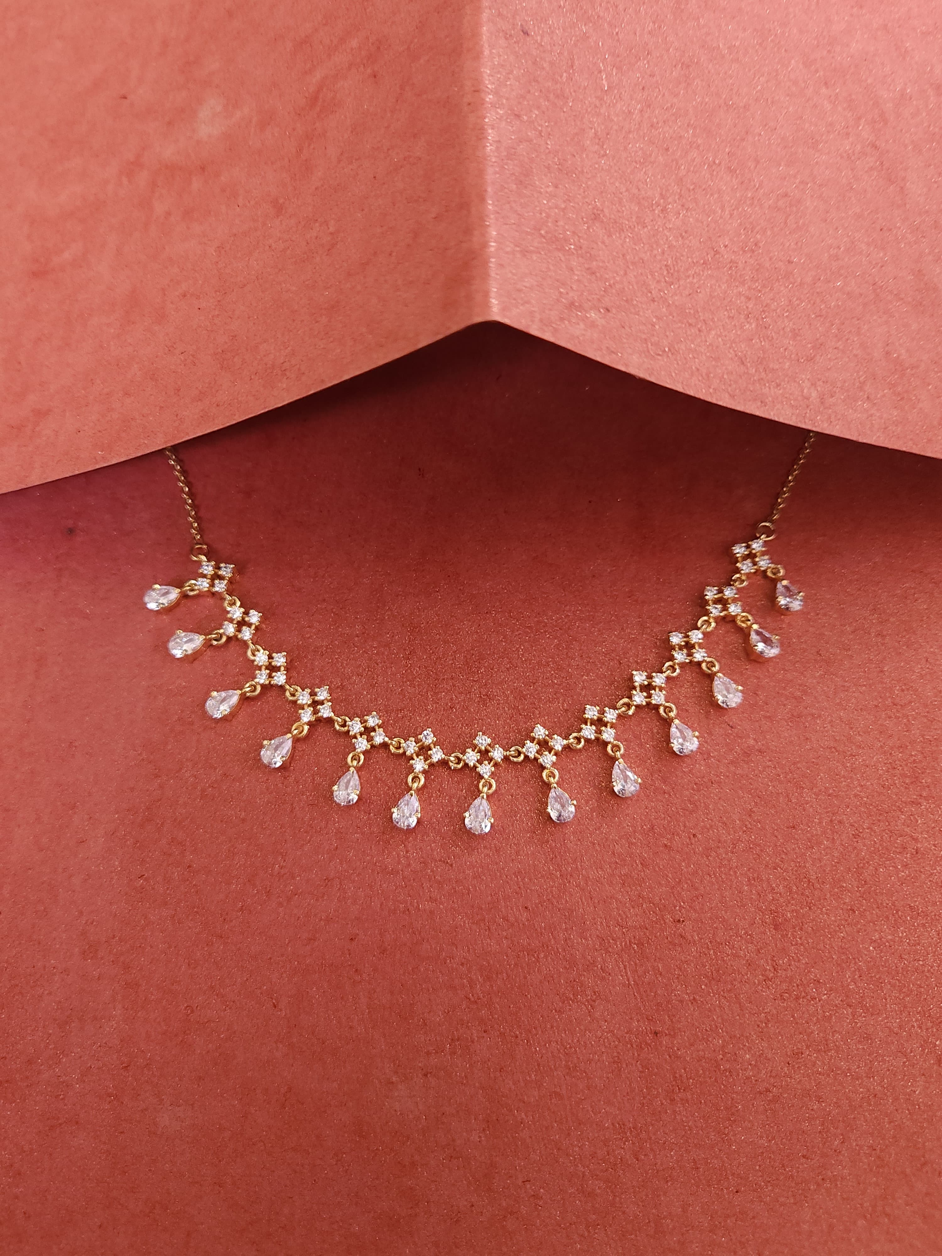 A classic silver chain with a smooth, polished finish and interlocking links, offering a timeless and versatile accessory.