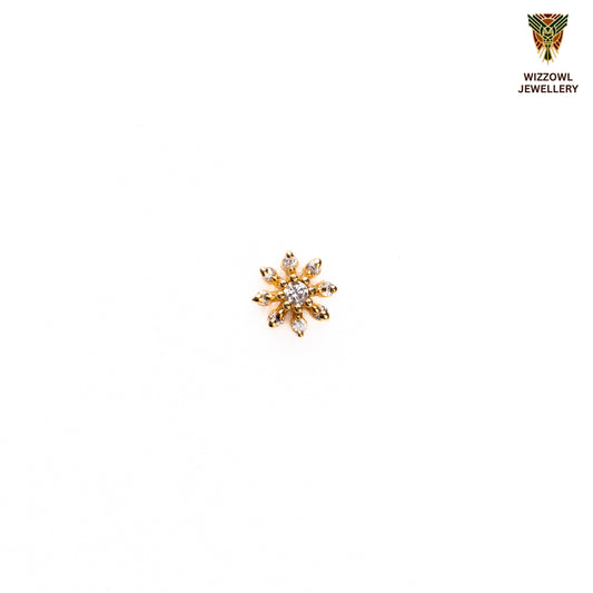 Silver nosepins featuring traditional motifs with a modern design twist, displayed on a neutral background.