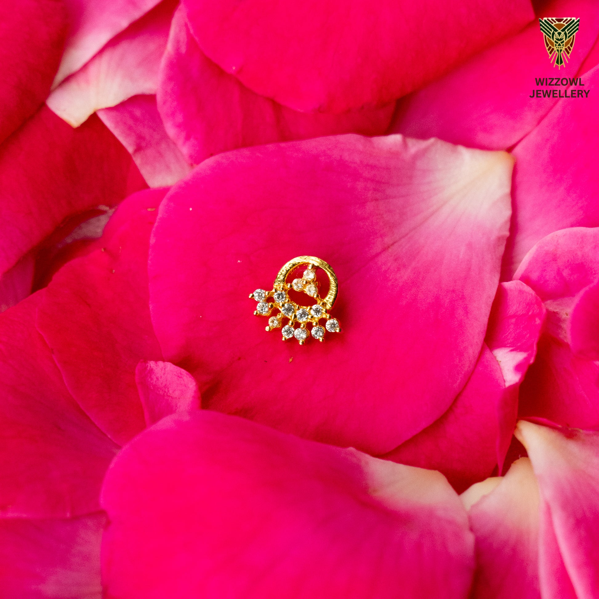 Silver nosepins featuring traditional motifs with a modern design twist, displayed on a neutral background.