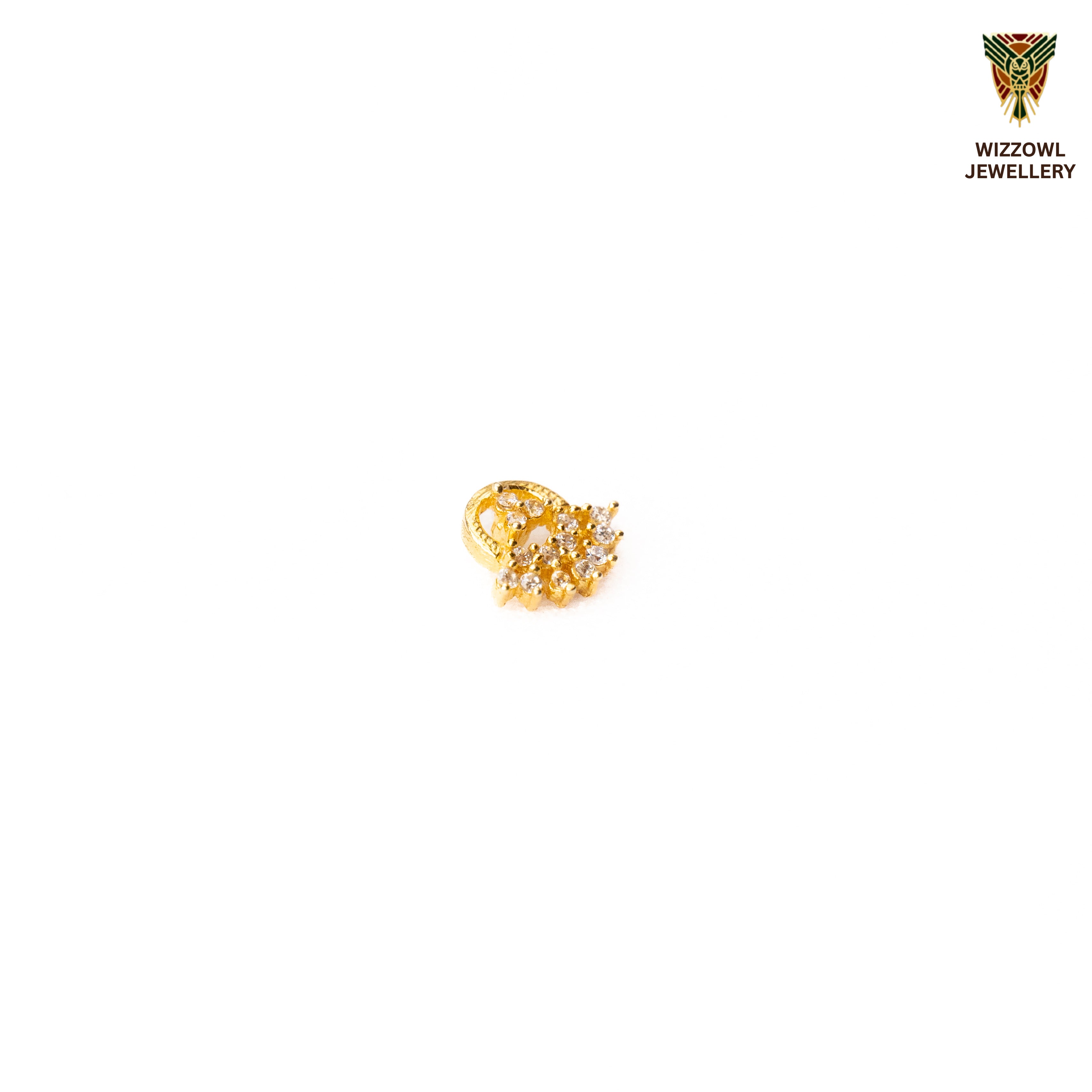 Silver nosepins featuring traditional motifs with a modern design twist, displayed on a neutral background.