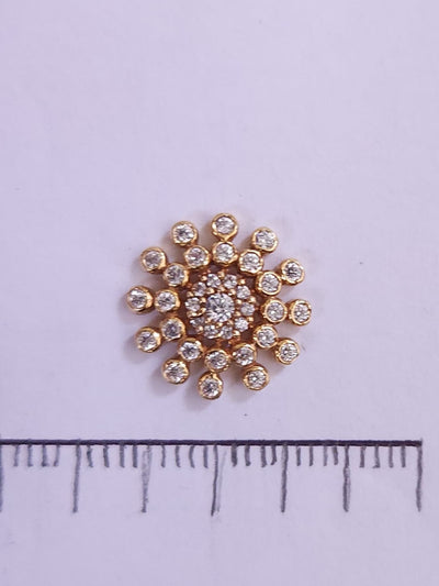 Silver nosepins featuring traditional motifs with a modern design twist, displayed on a neutral background.