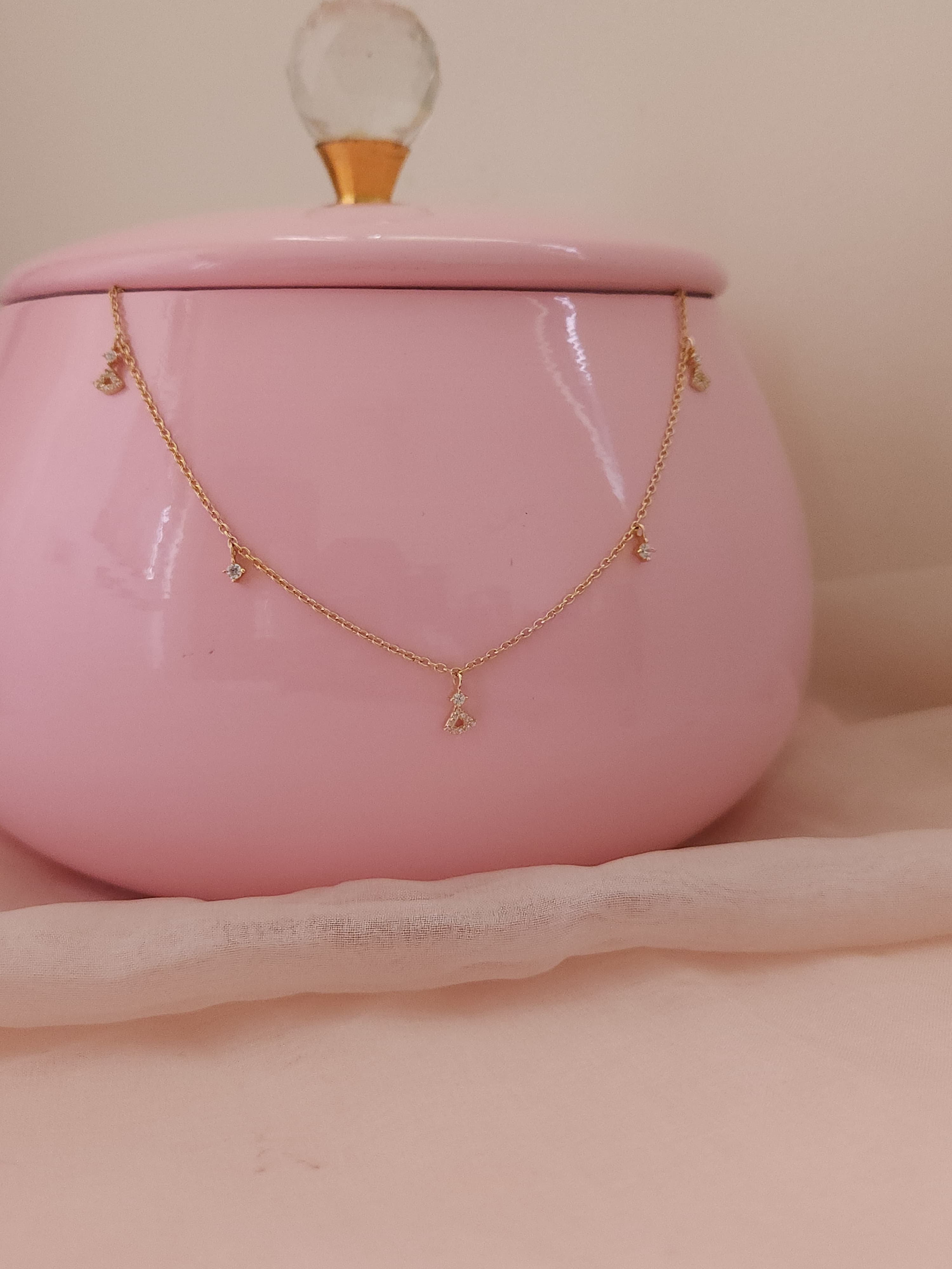 A classic silver chain with a smooth, polished finish and interlocking links, offering a timeless and versatile accessory.