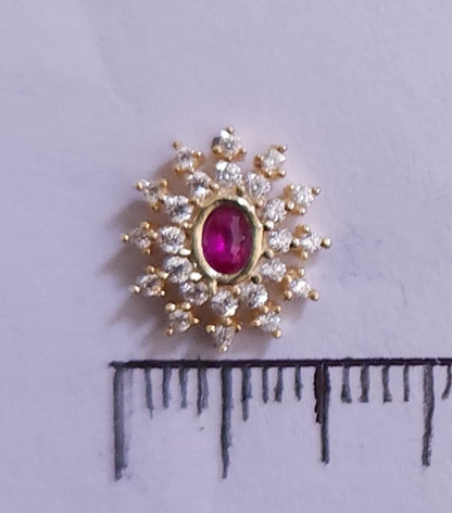 Silver nosepins featuring traditional motifs with a modern design twist, displayed on a neutral background.