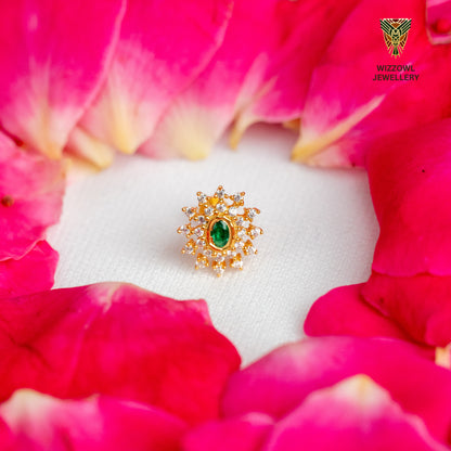 Silver nosepins featuring traditional motifs with a modern design twist, displayed on a neutral background.
