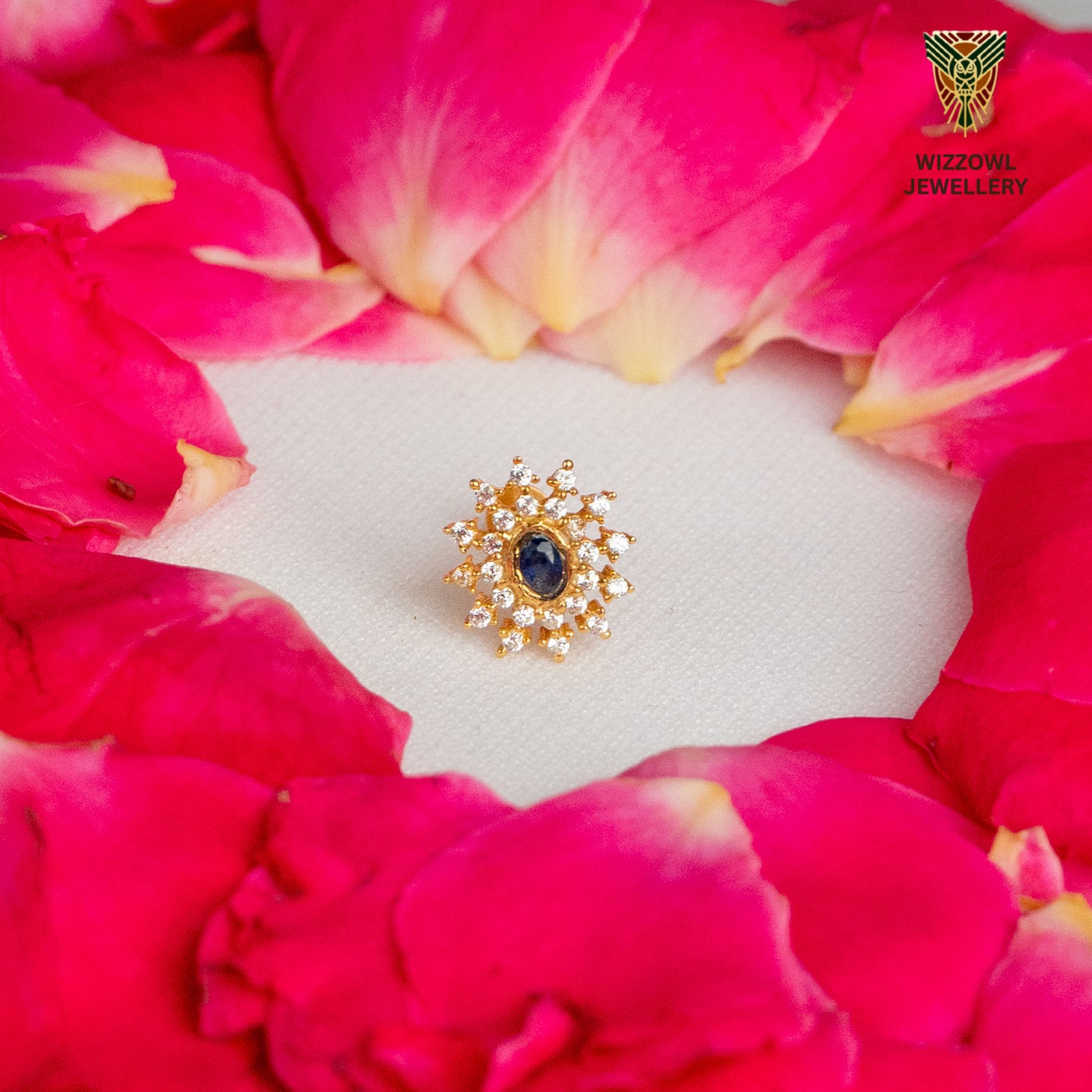 Silver nosepins featuring traditional motifs with a modern design twist, displayed on a neutral background.