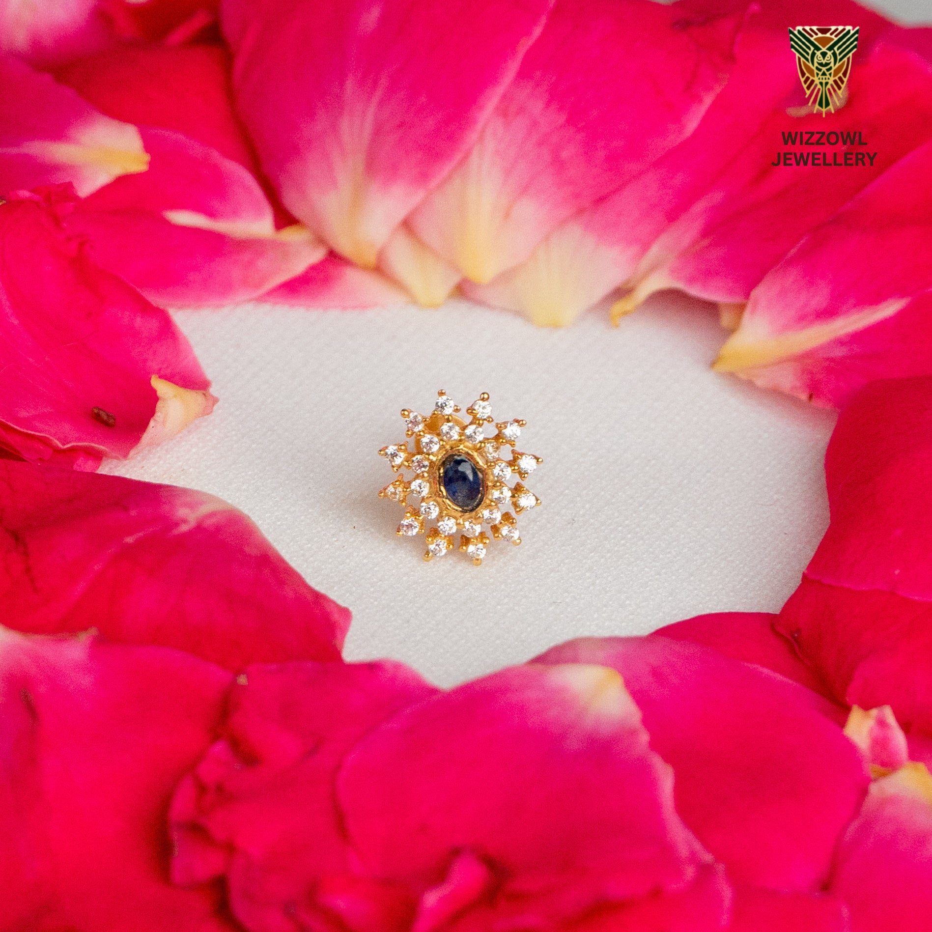 Silver nosepins featuring traditional motifs with a modern design twist, displayed on a neutral background.