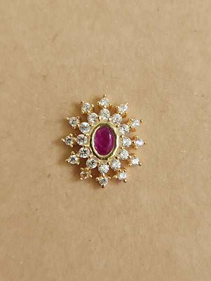 Silver nosepins featuring traditional motifs with a modern design twist, displayed on a neutral background.