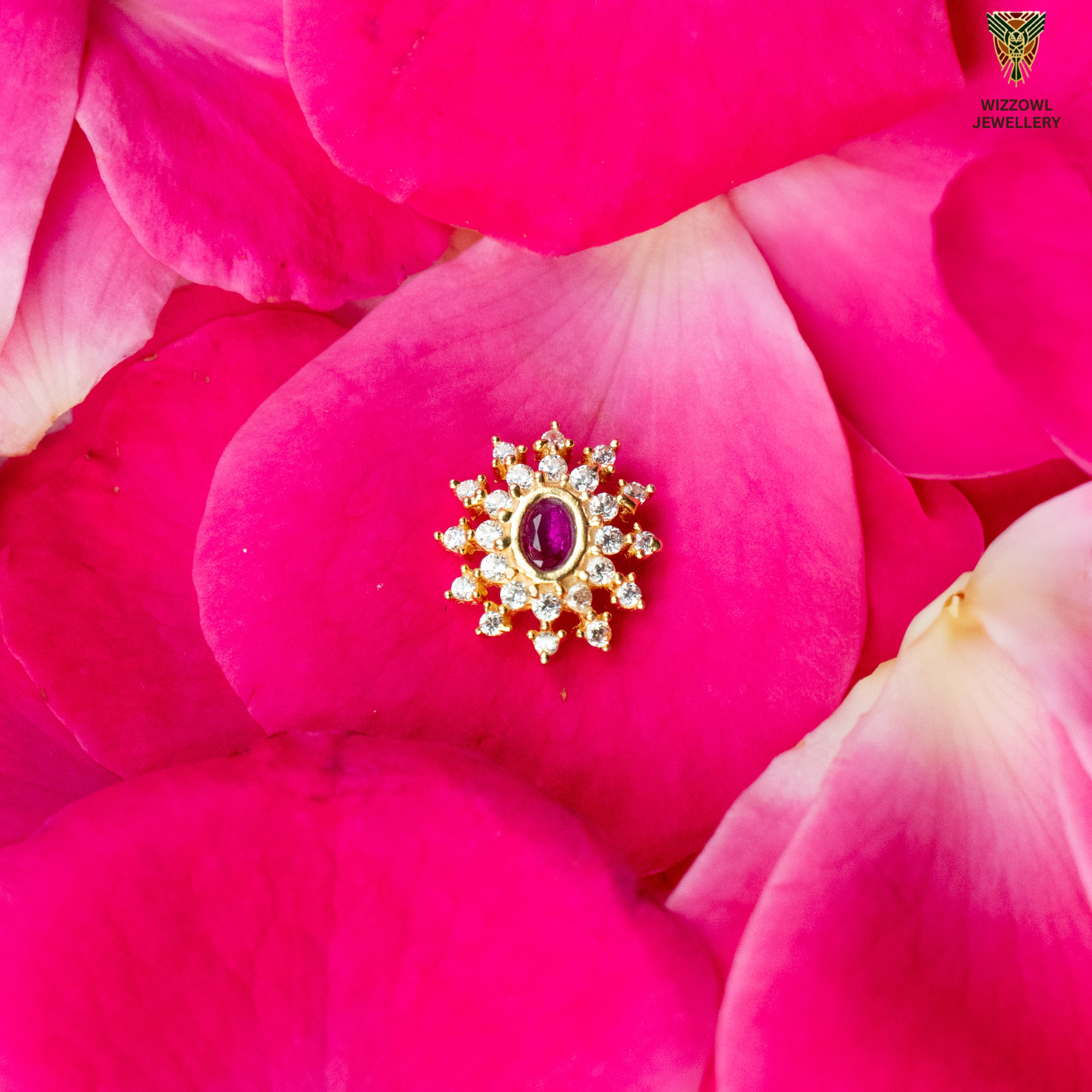 Silver nosepins featuring traditional motifs with a modern design twist, displayed on a neutral background.