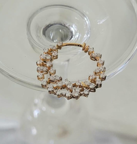 Silver nosepins featuring traditional motifs with a modern design twist, displayed on a neutral background.