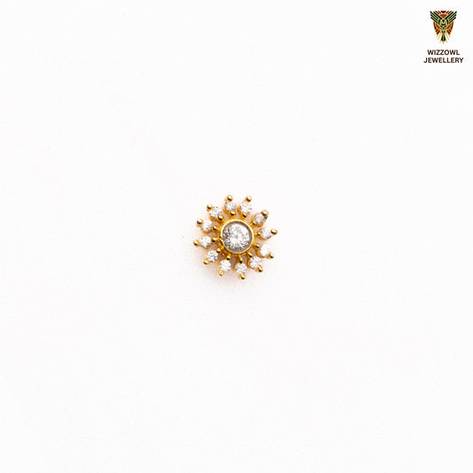 Silver nosepins featuring traditional motifs with a modern design twist, displayed on a neutral background.