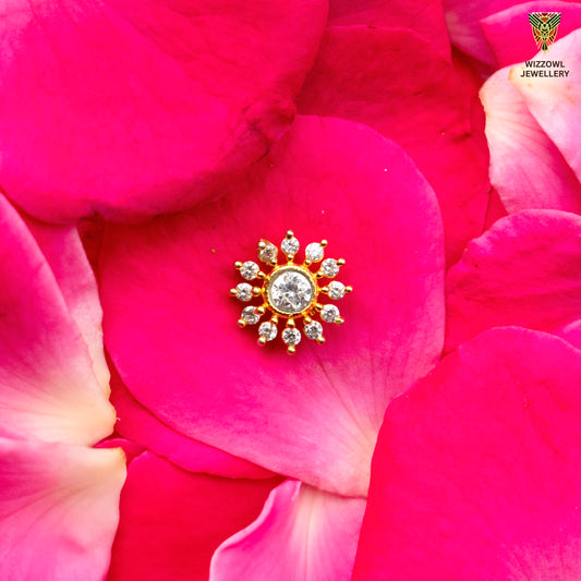 Silver nosepins featuring traditional motifs with a modern design twist, displayed on a neutral background.