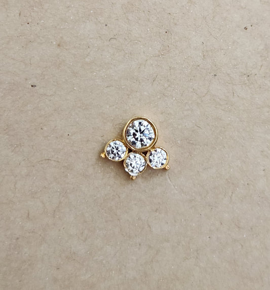 Silver nosepins featuring traditional motifs with a modern design twist, displayed on a neutral background.