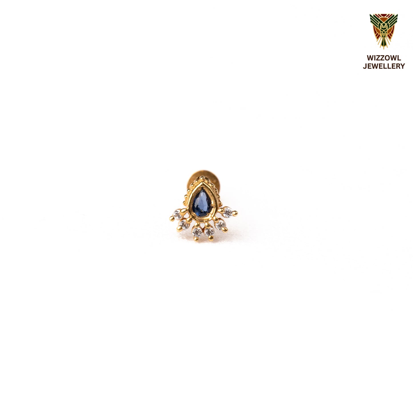 Silver nosepins featuring traditional motifs with a modern design twist, displayed on a neutral background.