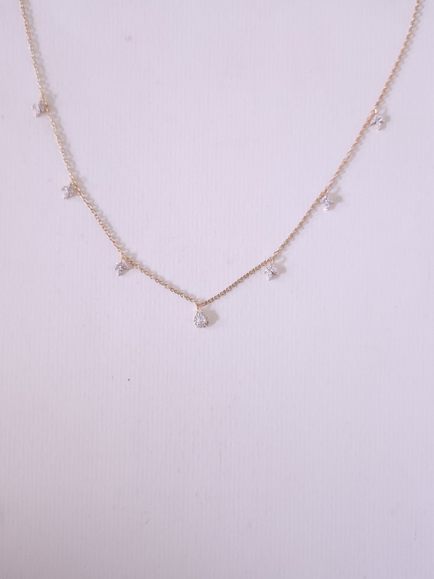 A classic silver chain with a smooth, polished finish and interlocking links, offering a timeless and versatile accessory.