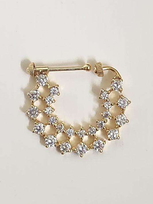 Silver nosepins featuring traditional motifs with a modern design twist, displayed on a neutral background.
