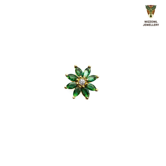 Silver nosepins featuring traditional motifs with a modern design twist, displayed on a neutral background.