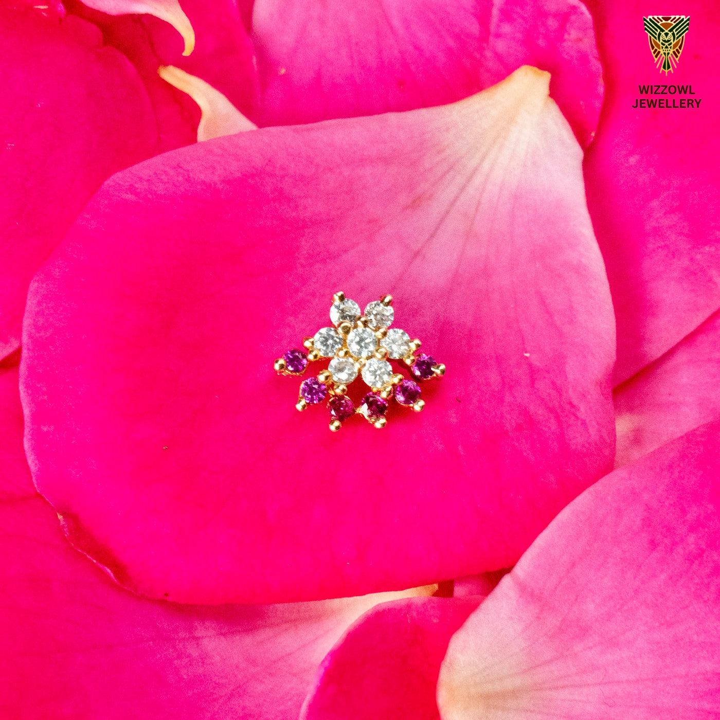 Silver nosepins featuring traditional motifs with a modern design twist, displayed on a neutral background.