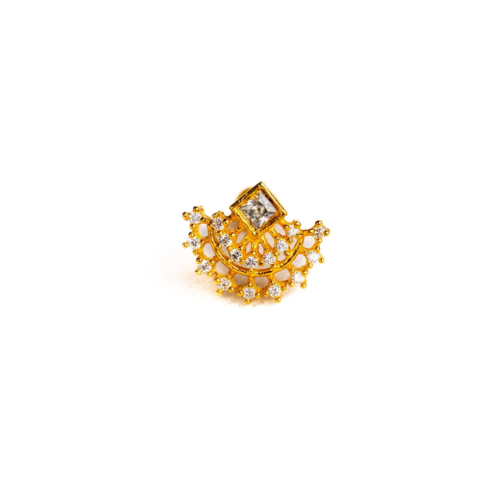 Silver nosepins featuring traditional motifs with a modern design twist, displayed on a neutral background.