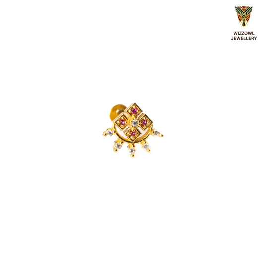 Silver nosepins featuring traditional motifs with a modern design twist, displayed on a neutral background.