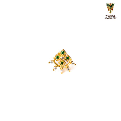 Silver nosepins featuring traditional motifs with a modern design twist, displayed on a neutral background.