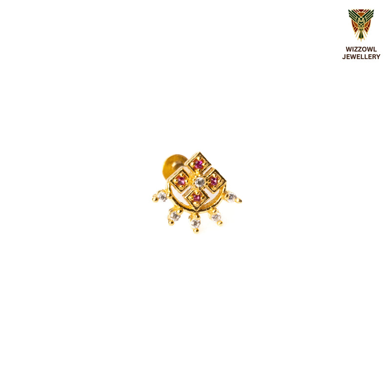 Silver nosepins featuring traditional motifs with a modern design twist, displayed on a neutral background.