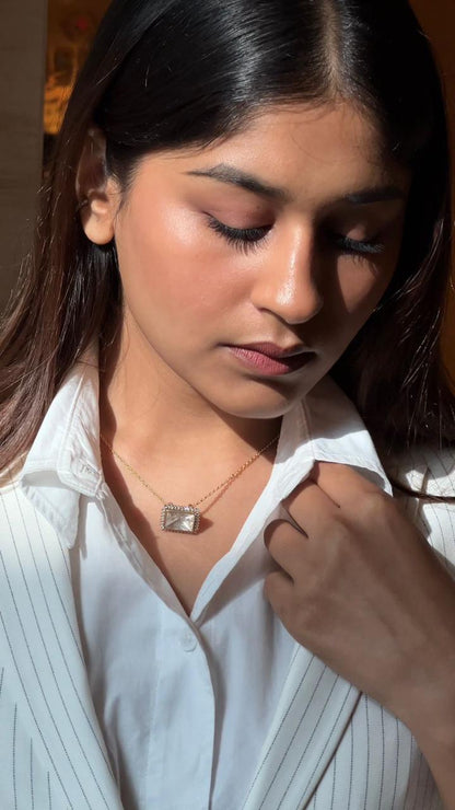 A classic silver chain with a smooth, polished finish and interlocking links, offering a timeless and versatile accessory.