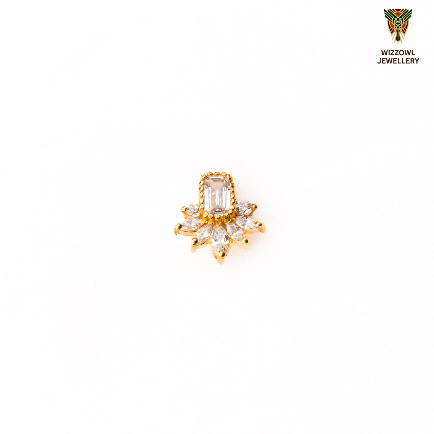 Silver nosepins featuring traditional motifs with a modern design twist, displayed on a neutral background.