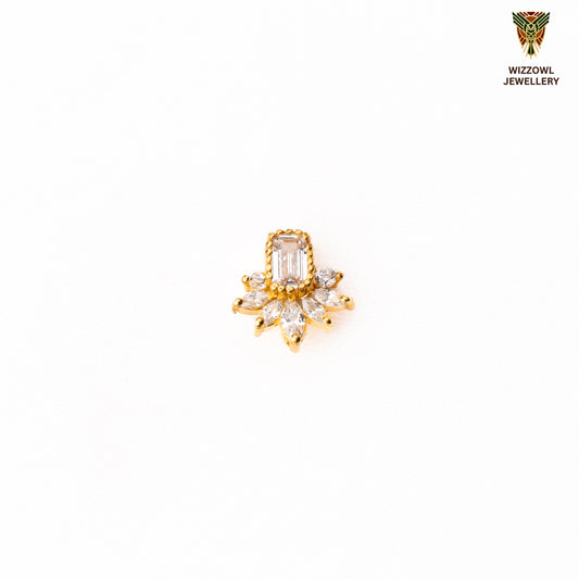 Silver nosepins featuring traditional motifs with a modern design twist, displayed on a neutral background.